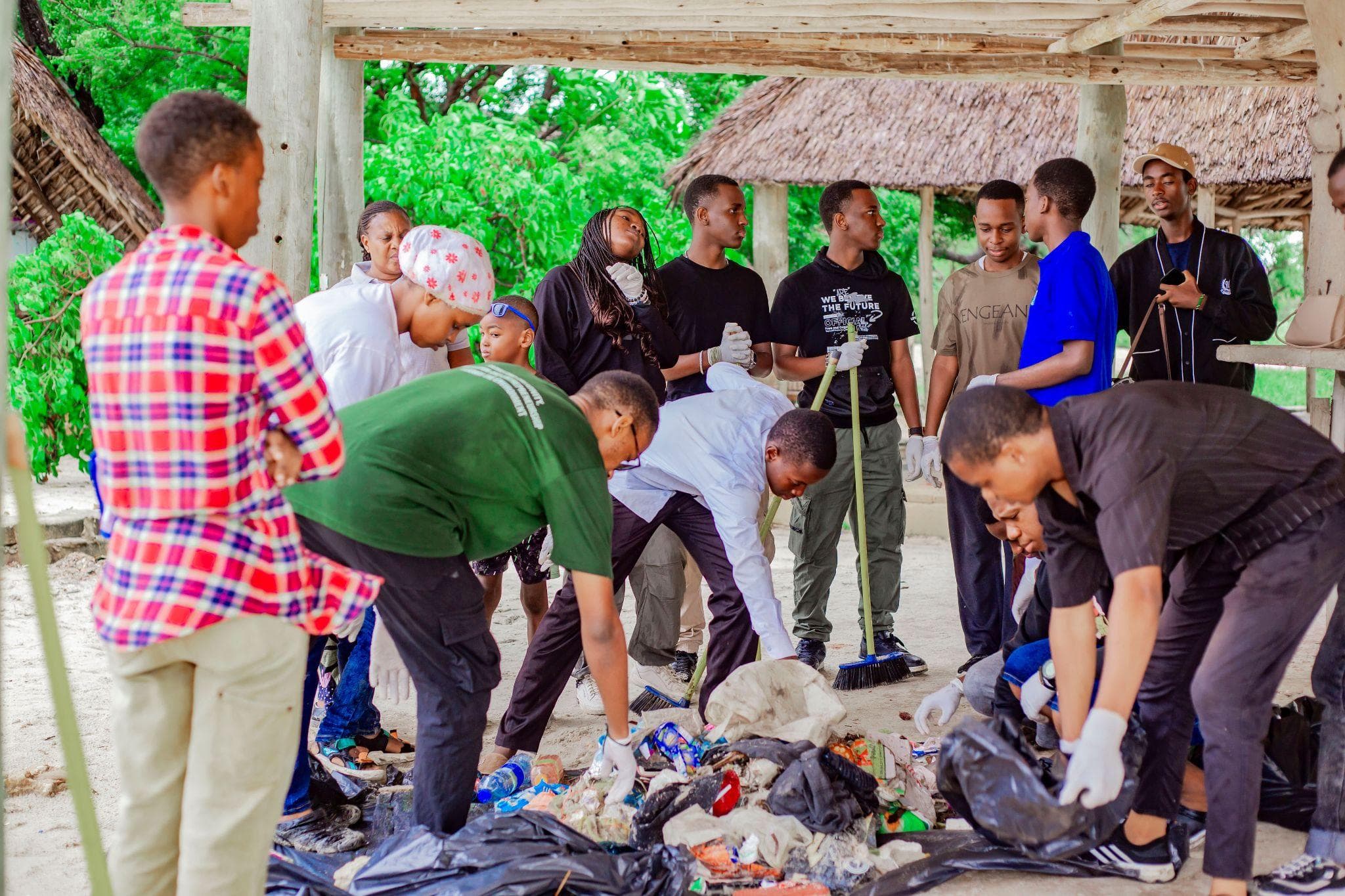 Volunteers sorting collected beach waste for an audit.