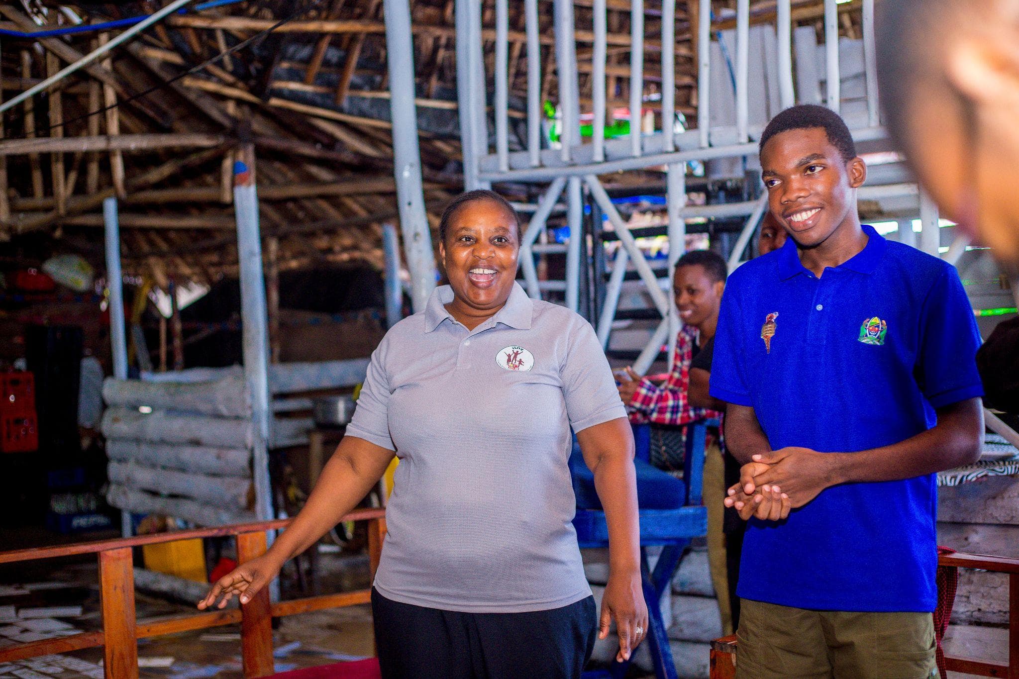 Two participants standing together during a group activity.